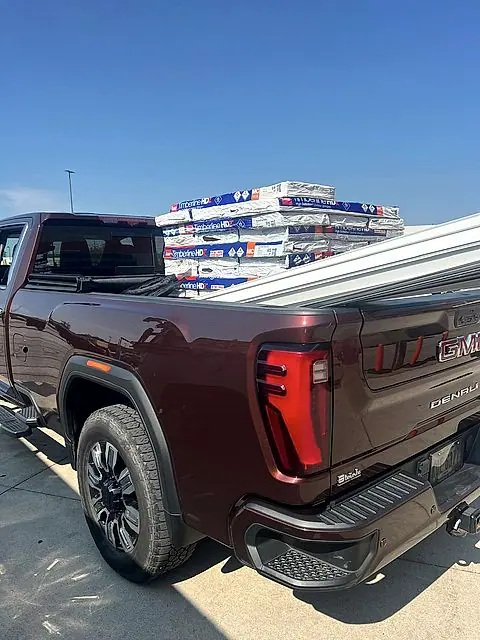 Work truck loaded with shingle pallets for a roof job in Lorain, Ohio